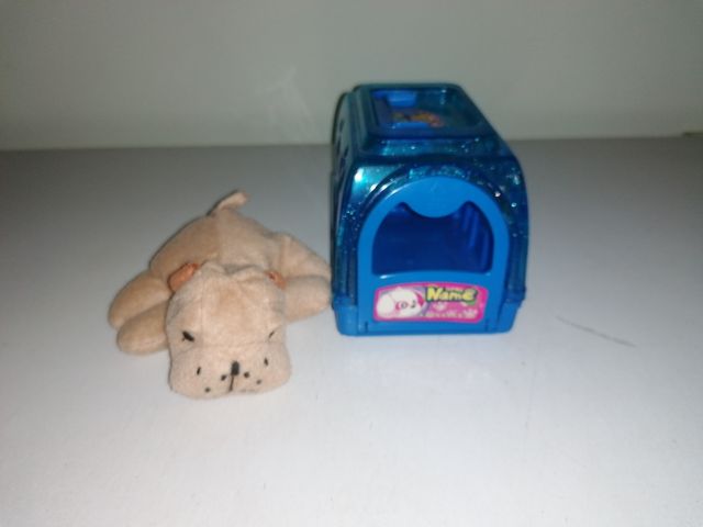 Cane di peluche e valigetta