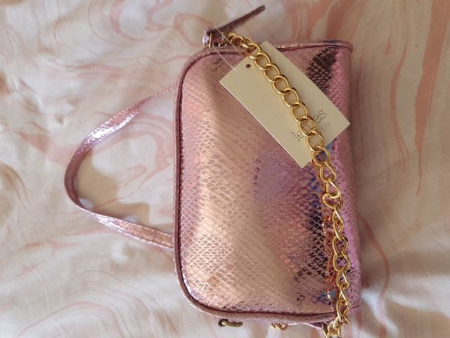 Bolso tipo clutch metalizado