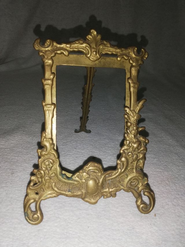 portafotos metálico antiguo