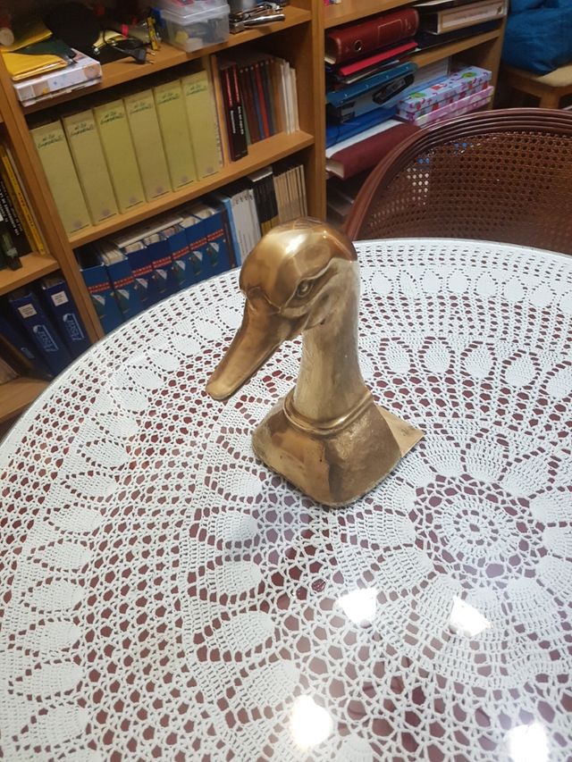 Pato sujeta libros vintage 