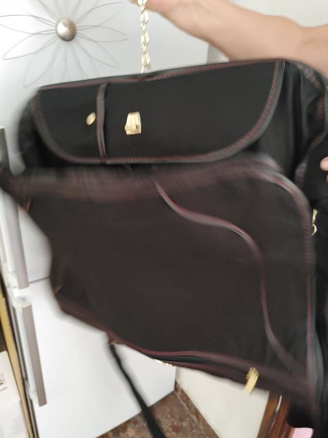 porta y guarda de trajes