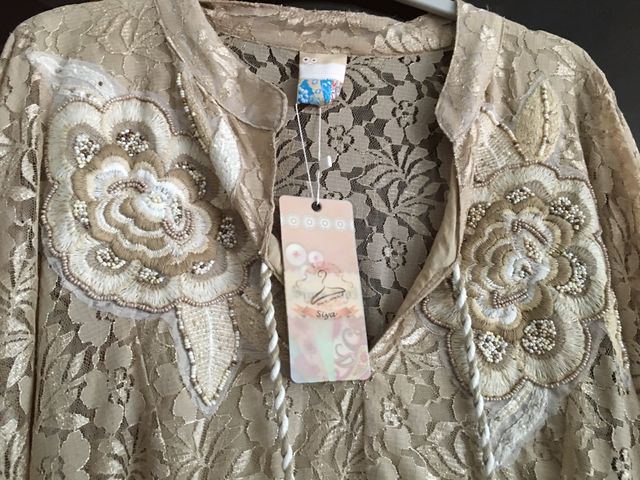 Ponchó muy bonito es talla único no pone talla