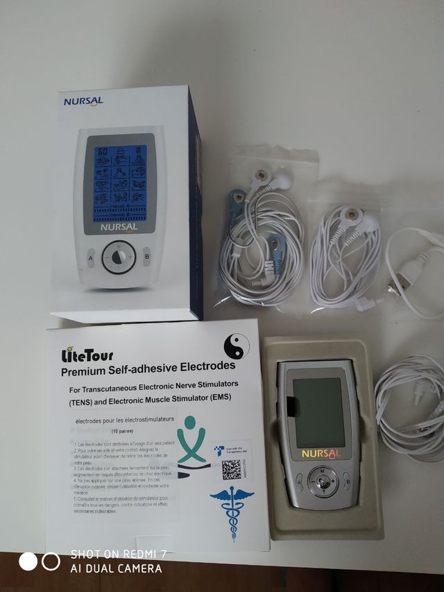 Estimulador y caja 10 pares de almohadillas.