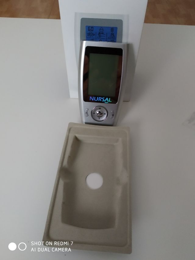 Estimulador y caja 10 pares de almohadillas.