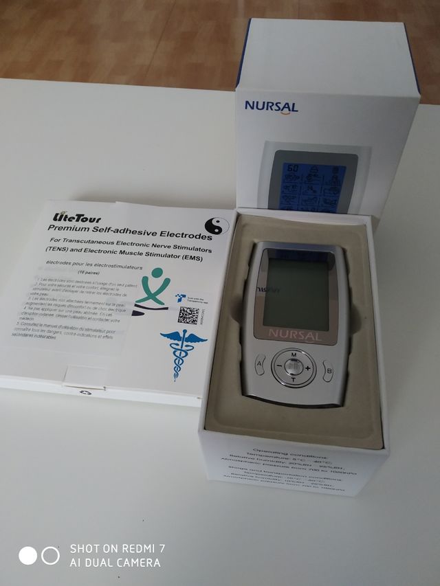 Estimulador y caja 10 pares de almohadillas.