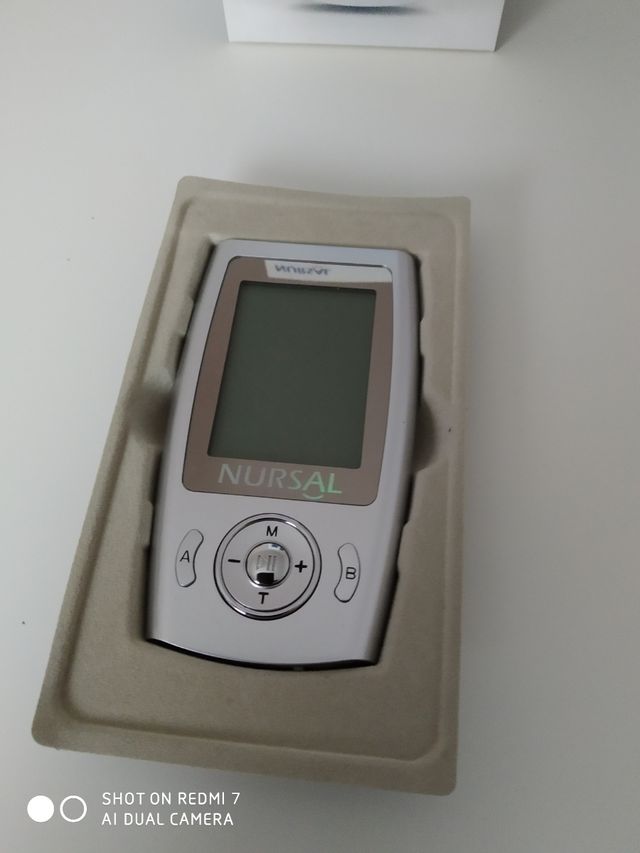 Estimulador y caja 10 pares de almohadillas.