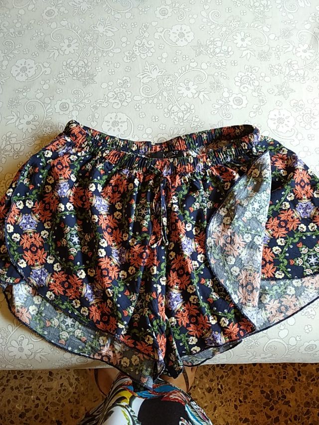 Lote dos pantalones cortos T/S según descripción