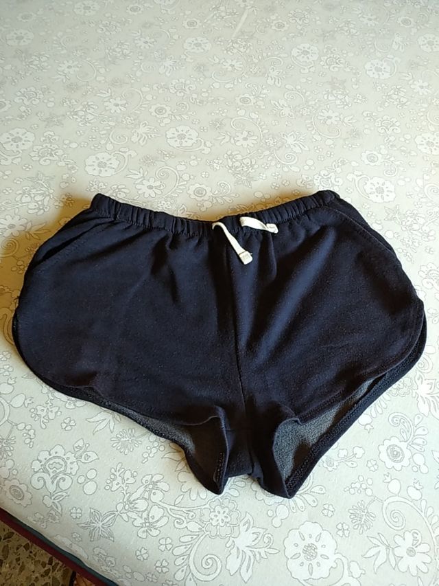 Lote dos pantalones cortos T/S según descripción