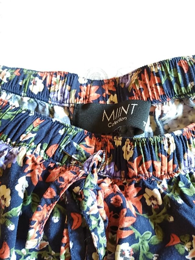 Lote dos pantalones cortos T/S según descripción