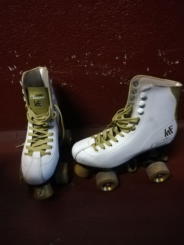 Patines de 4 ruedas + bolsa.