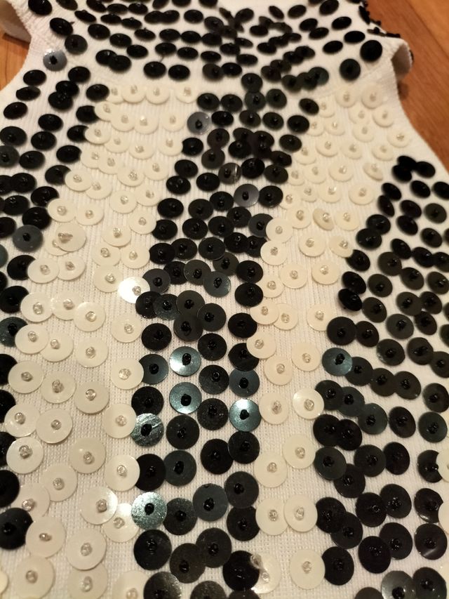 Top nuevo blanco de punto y lentejuelas