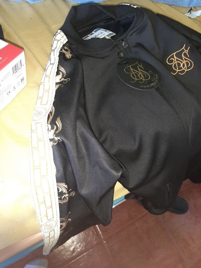 Chaqueta SikSilk sin estrenar con etiqueta.