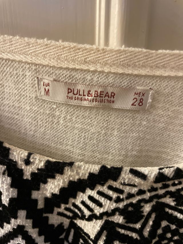 Jersey fino blanco con decorado étnico negro