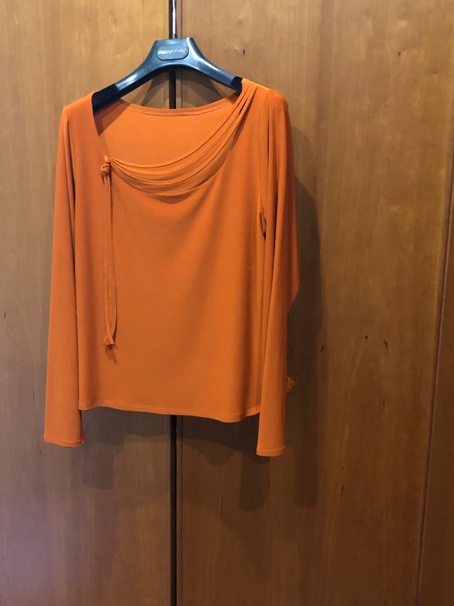 Blusa color teja, licra muy buen tejido, el delan