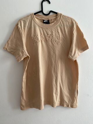 Camiseta Nike rosa palo de segunda mano por 6 EUR en Paterna en WALLAPOP