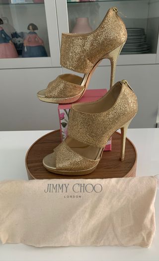 Sandalias abotinadas Jimmy Choo Doradas de segunda mano por 298 EUR en San  Fernando en WALLAPOP