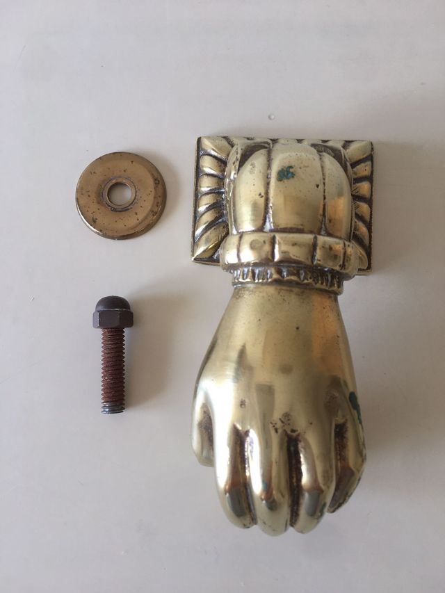 Llamador antiguo de latón