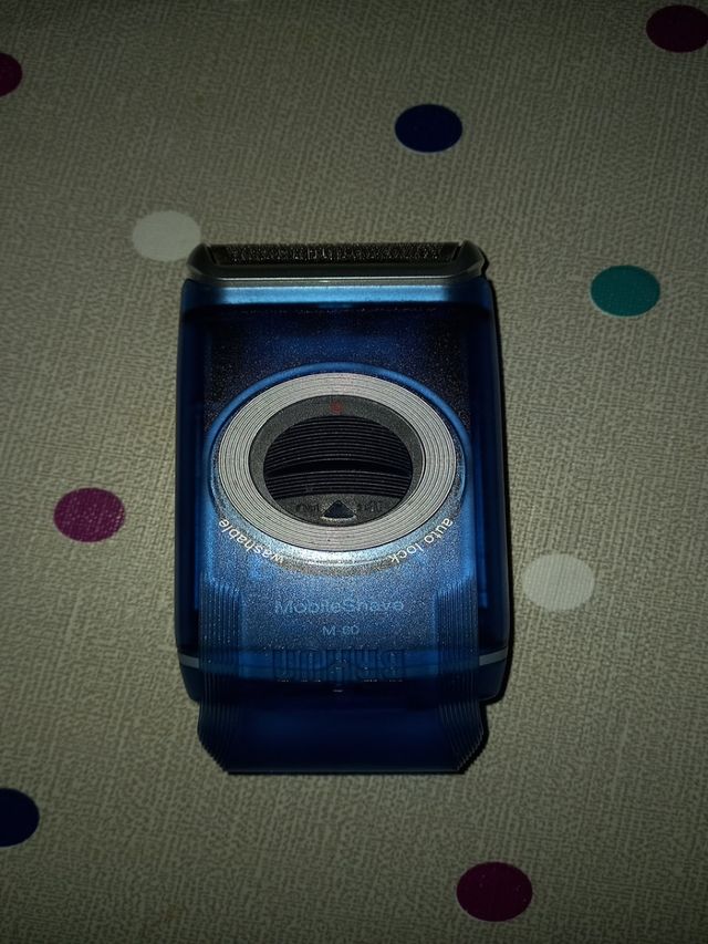 Máquina de afeitar.