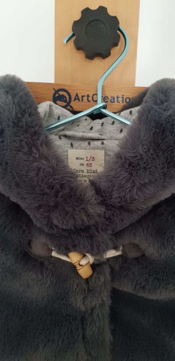 Buzo pelo capucha gris