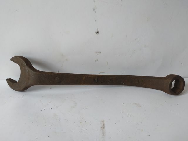 ANTIGUA LLAVE FIJA CURVA.