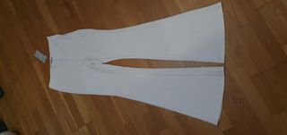 Pantalon pata de elefante blanco de segunda mano por 15 EUR en Almería en  WALLAPOP