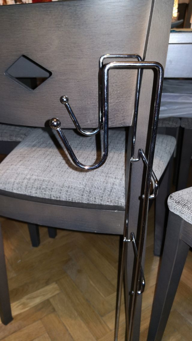 Percha y soporte para mampara