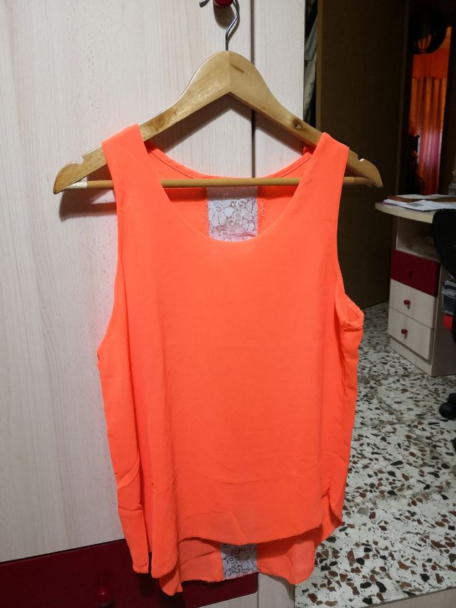 Blusa naranja fosforito