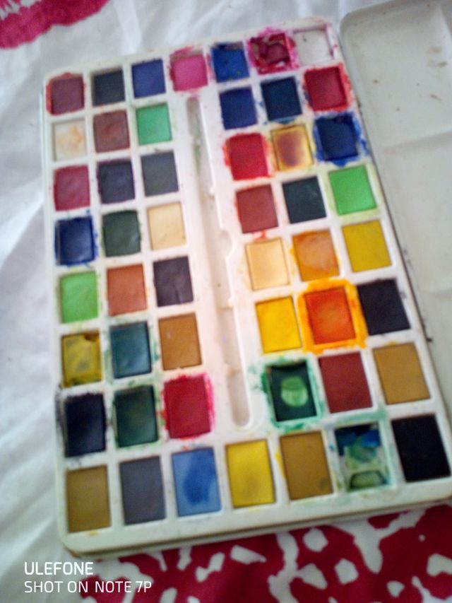 Acuarelas caja metal. Page of london