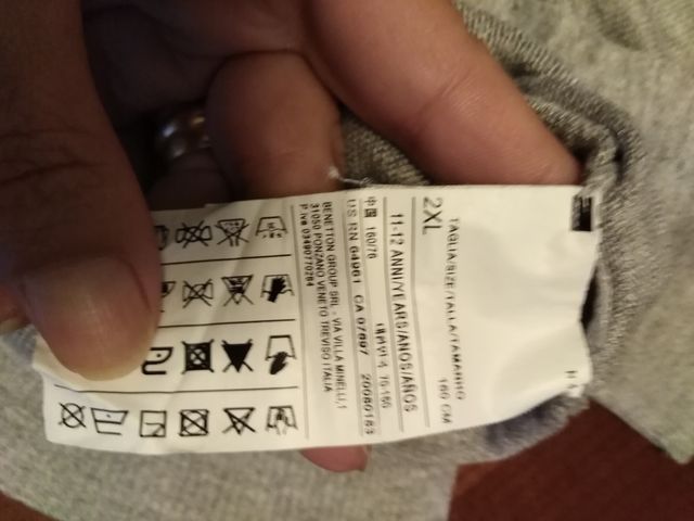 maglia donna con decorazioni in paillettes 