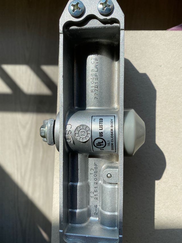 Muelle hidráulico puerta