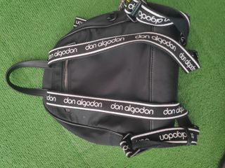 Mochila negra Don Algodón de segunda mano por 5 EUR en Noia en WALLAPOP