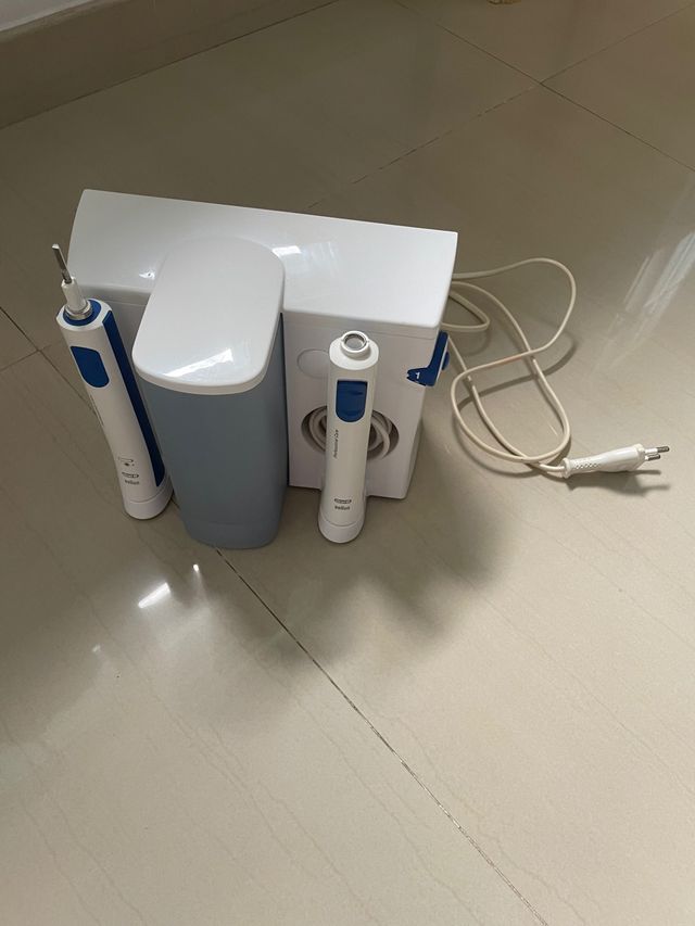 Cepillo electrico oral b con irrigador
