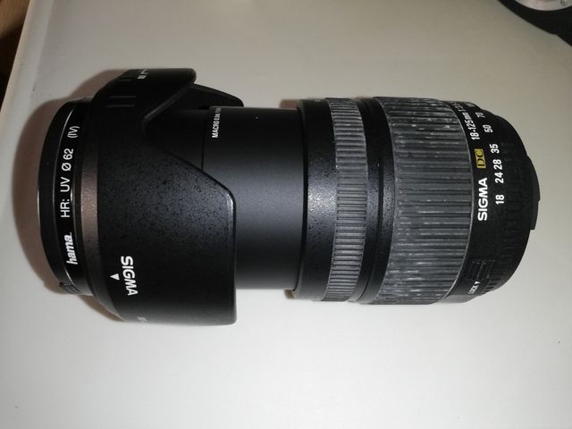 Objetivo Sigma DC 18-125mm con parasol.