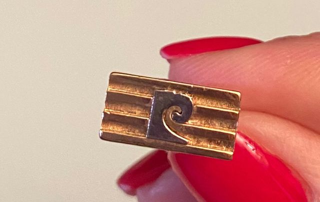 Gemelos y aguja de corbata