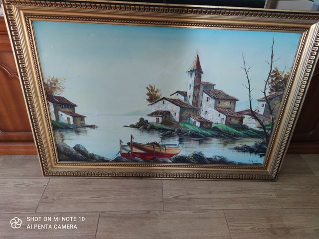 Cuadro con marcó dorado