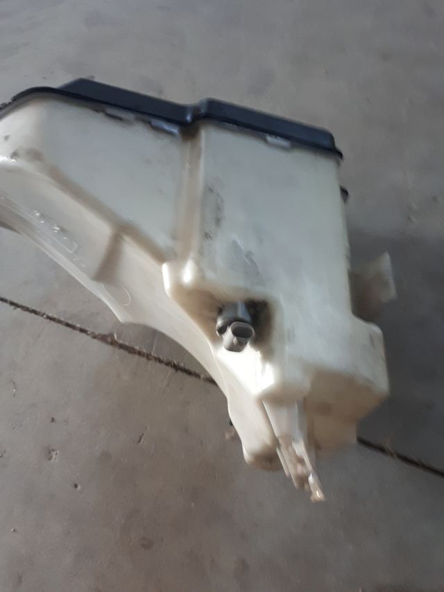 botella de agua de limpiaparabrisas