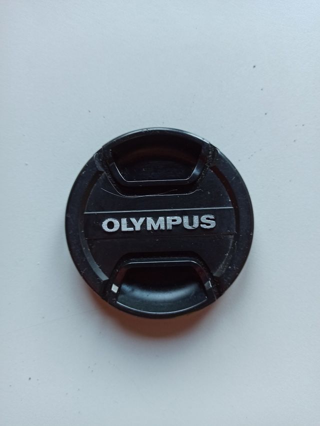 tapa frontal Olympus 57mm