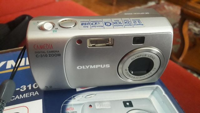 camara digital olympus.con tarjeta de memoria.