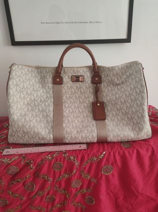 Michael Kors bolso de viaje de segunda mano por 160 EUR en Madrid en  WALLAPOP