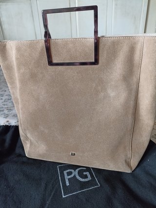 Bolso de ante . Purificación García de segunda mano por 90 EUR en  Majadahonda en WALLAPOP