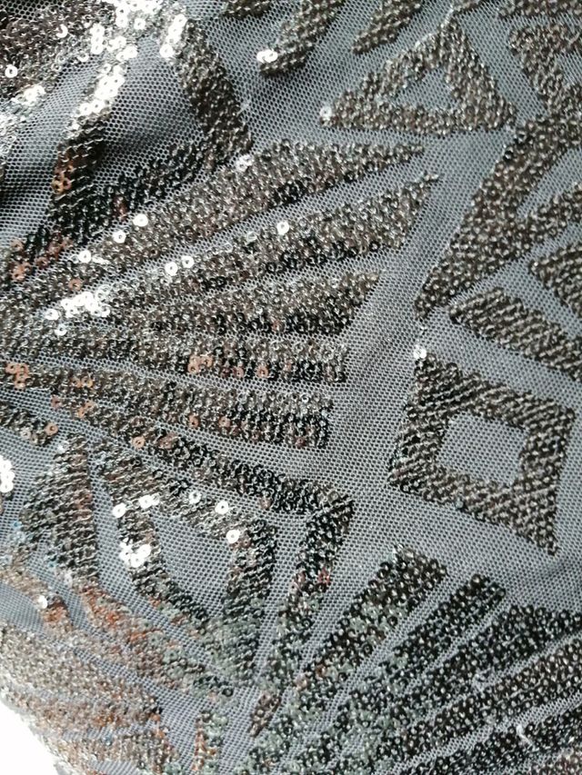 vestido negro de lentejuelas