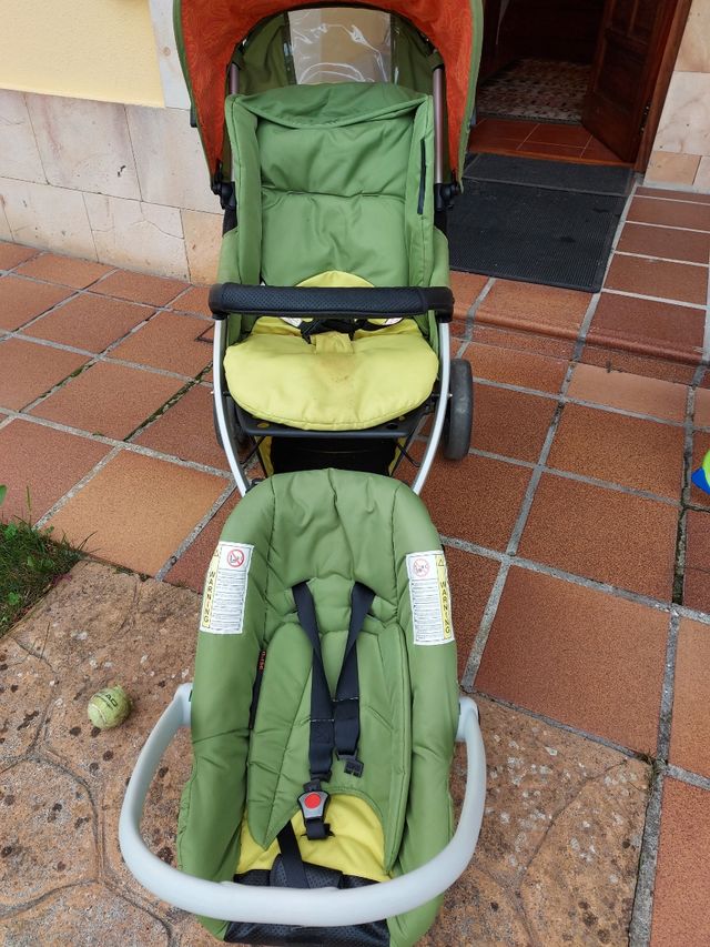 silla de paseo y huevo