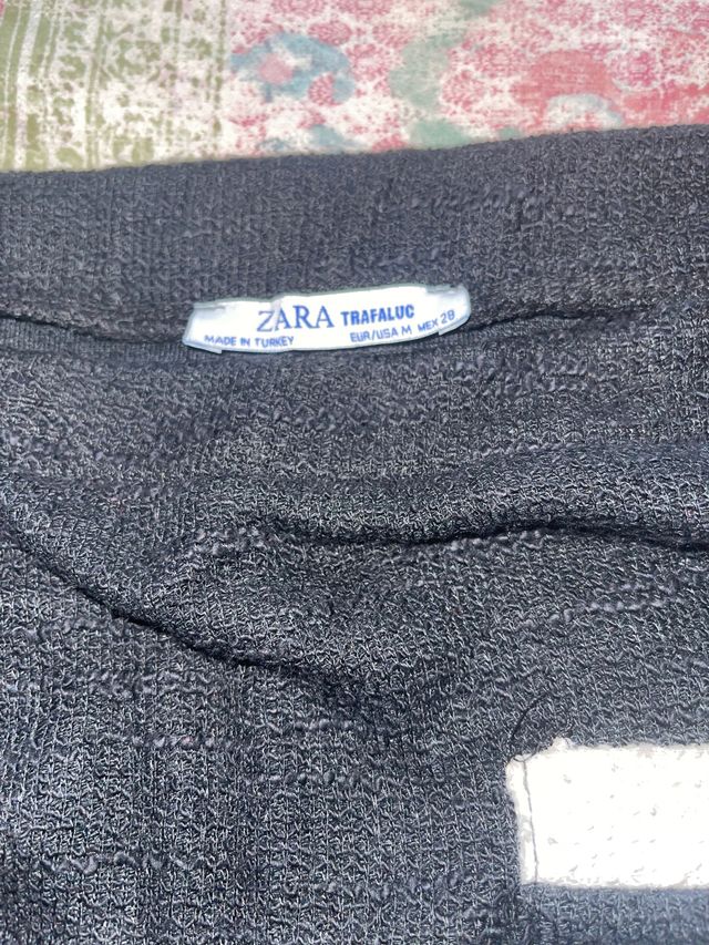 Minifalda negra bolsillos