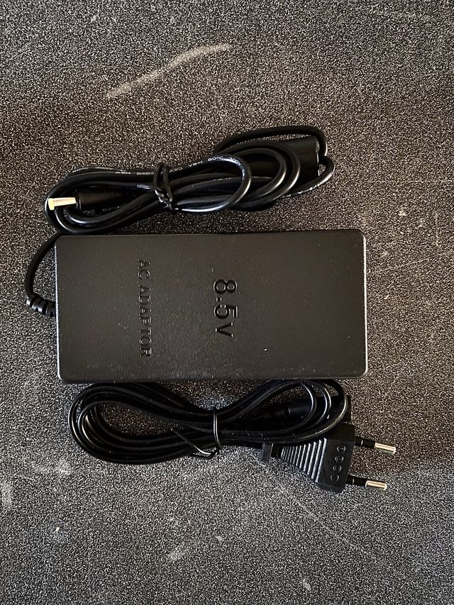 Cargador transformador para Playstation 2