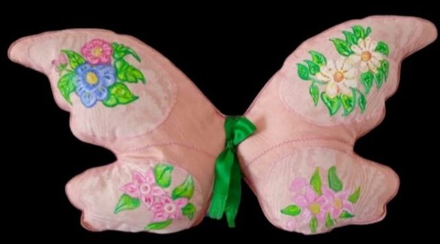 Cojin artesanal mariposa.