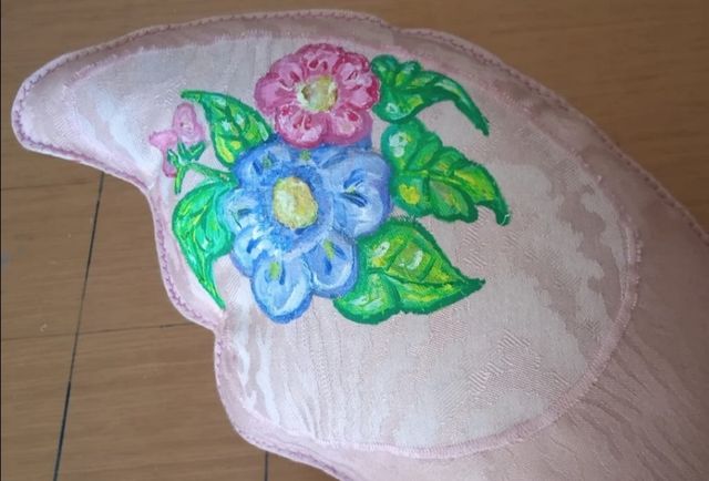 Cojin artesanal mariposa.