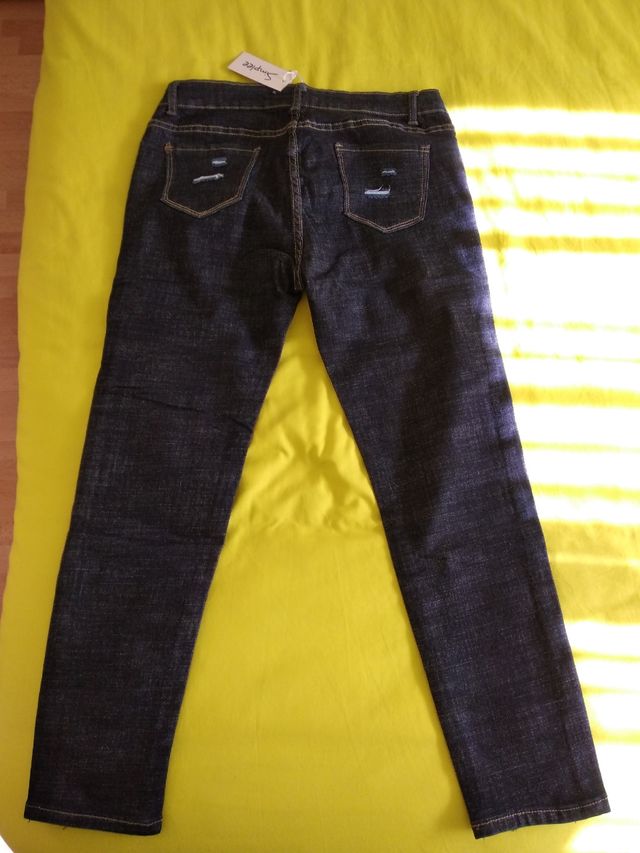 vaqueros chica con red. nuevos talla 40/42. L