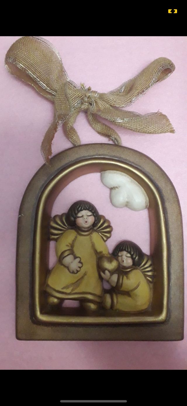 Formella angeli thun