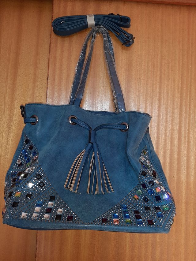 Bolso grande azul.