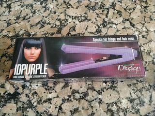 Plancha pelo flequillo y puntas de segunda mano por 4 EUR en Barcelona en  WALLAPOP